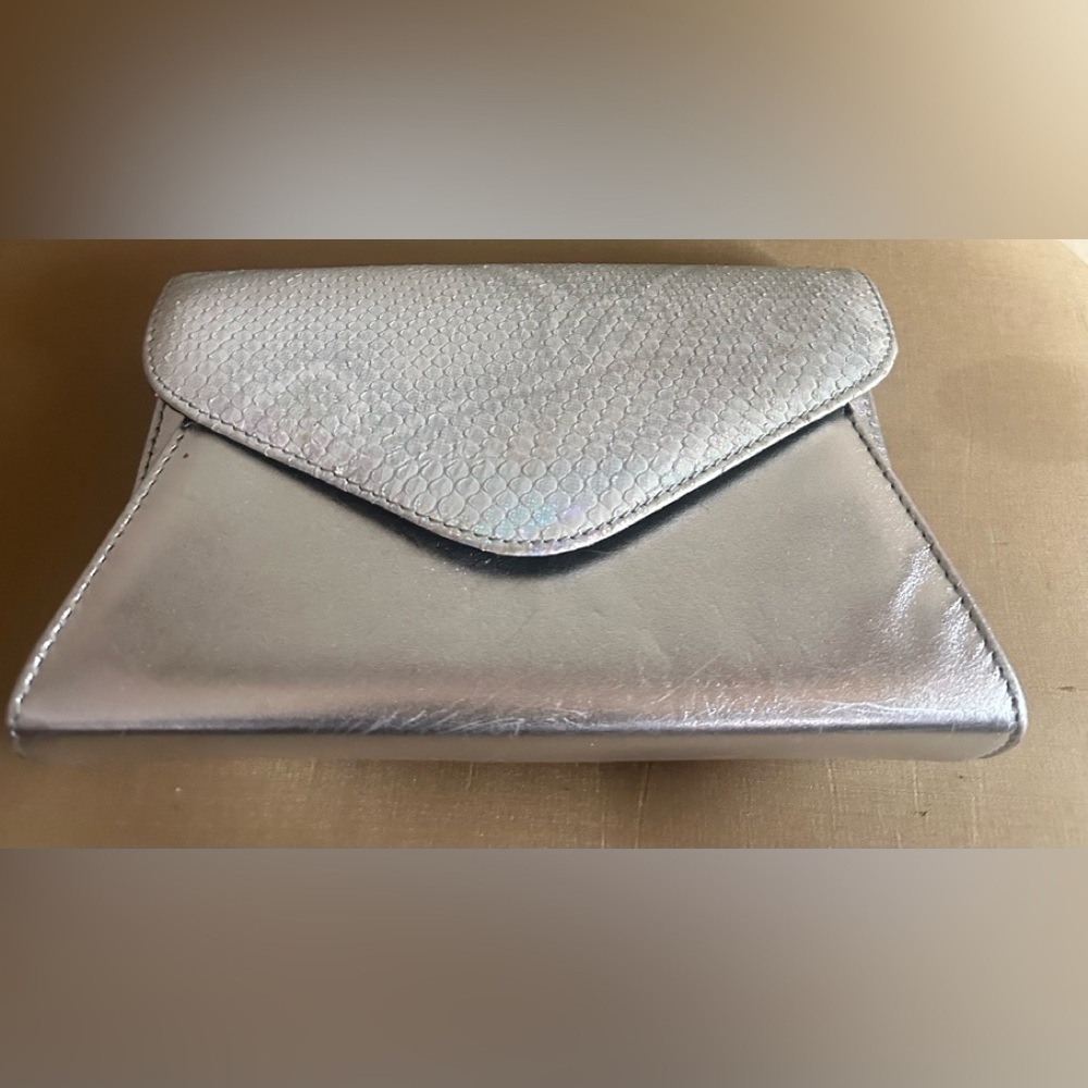 Small silver purse with iridescent faux white snakeskin print and silver chain